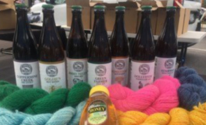 bottles of beer and colorful yarn